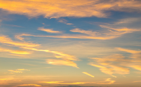 cloud and golden sky in twilight timeの写真素材