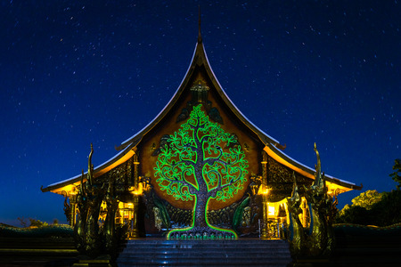 fluorescent tree at pavilion at a templeの写真素材