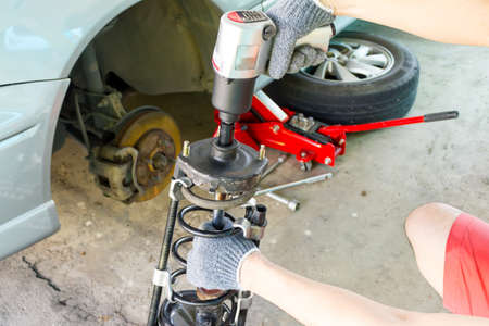 Disassembling car shock absorber, Close up.の写真素材