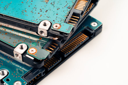 Close up of old computer hard disk drive isolated on white background.