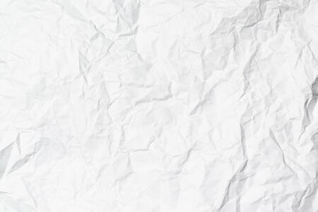 white crumpled paper texture overlay background for use as layerの写真素材