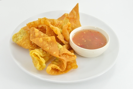 Deep Fried Wonton or dumpling on white dishの写真素材