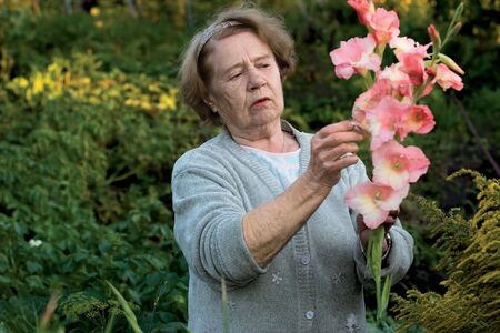 Portrait of the elderly woman with colorsの写真素材