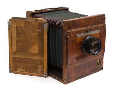 Wooden retro the camera it is isolated on a white backgroundの写真素材