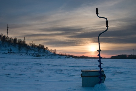 Sunset in the winter on winter fishingの写真素材