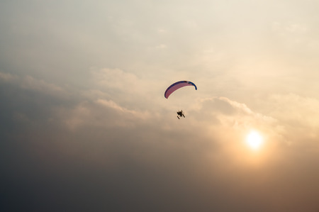 paraglider  in flightの写真素材