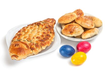 Easter cakes and eggs isolated on white