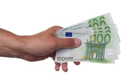 Hand holding hundred euro notesの写真素材