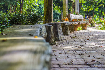 Concrete seating on stamp concrete walk way in the parkの写真素材