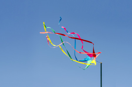 An image of colorful wind measurement ribbon and wind sockの写真素材