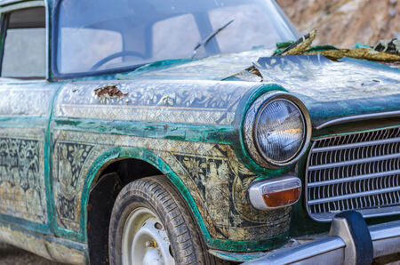 SARABURI PROVINCE, THAILAND - DECEMBER 10 2014 : An old car which decorated by Thai pattern parked on display at the flooding market named " Baan nok " loacted in Saraburi, Thailandのeditorial素材