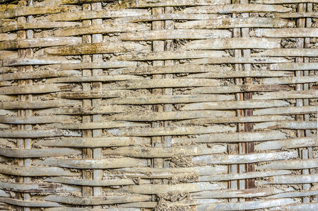 Rice storage containers made of woven bamboo and clay.の写真素材