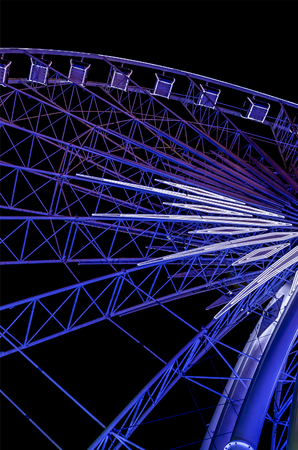 Night view of ferris wheel which decorate by a lot of  LED lamp