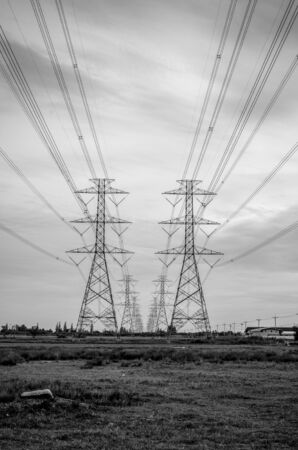 Black and white image of high voltage electricity pylonの写真素材