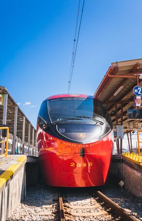 KAWAGUCHIKO,JAPAN 14 MAR 2019 Red color train Fujisan view express parking at Kawaguchiko Station on  a clear blue sky dayのeditorial素材