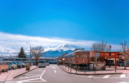 KAWAGUCHIKO,JAPAN 14 MAR 2019 Kawaguchiko station and Train model 1897 display with Mt.Fuji in the background with a lot of car parking at the stationのeditorial素材