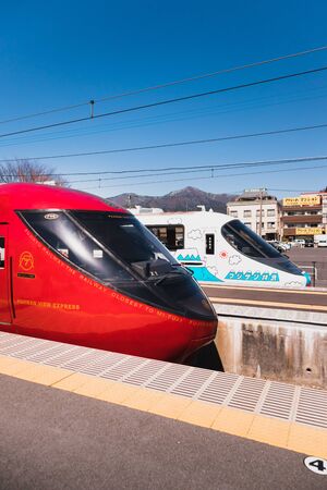 KAWAGUCHIKO,JAPAN 14 MAR 2019 Two Fujisan view express from Otsuki station parking at Kawaguchiko Station on clear blue sky dayのeditorial素材
