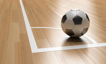 Football on Wooden Court Floor Corner close up with light reflection.Soccer court Futsal 3D renderingの写真素材