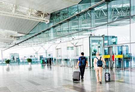 HANOI,VIETNAM 27 OCT 2019 - Traveller walking in front of Departure Hall at the Hanoi International Airport (Noi Bai) Vietnam.のeditorial素材