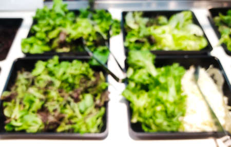 Close up of Blurred green salad bar. Healthy eating conceptの写真素材