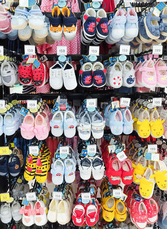 BANGKOK,THAILAND - May 20,2021 - Baby shoes collection display at Department store Baby cloth section.のeditorial素材
