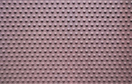 Metal steel texture with Polka dots pattern background.Rusty Iron wall background.の写真素材