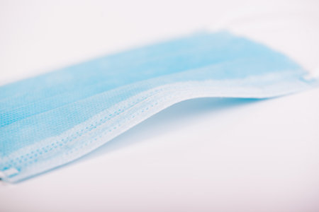 Blue mask still life close up shoot with white background copy spaceの写真素材