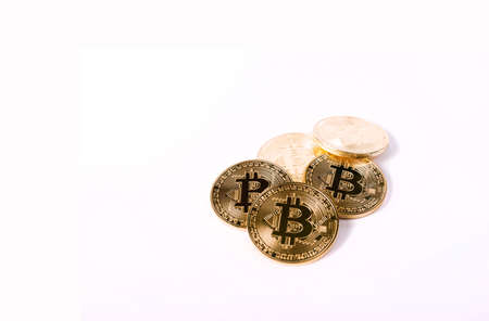 Bitcoin Crypto Currency - Close Up Of Set Of Golden Bitcoin Coins Isolated On White Background. Bitcoin Domination Concept. Copy Space.の写真素材