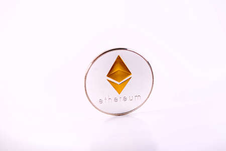 Ethereum Crypto Currency Coin Standing Isolated On White Background. Virtual money concept. Mining or blockchain technology.の写真素材