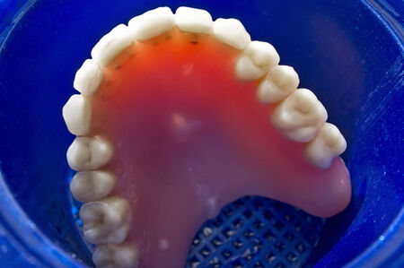 denture used in the blue boxの写真素材