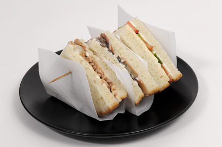 delicious Italian sandwiches on a black dishの写真素材
