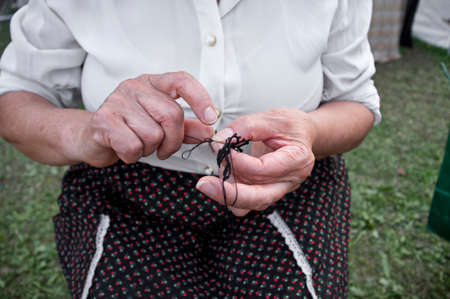 close-up of hands knittingの写真素材