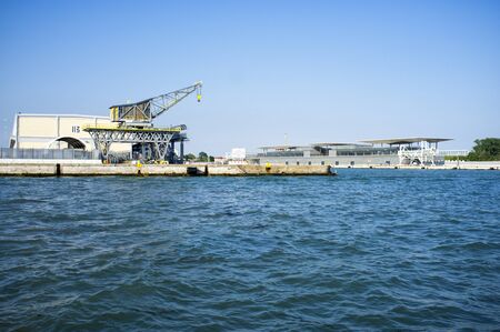 10 - May - 2019, Venice, Italy - Cruise Terminals in the seaport of Venice, seen from the sea