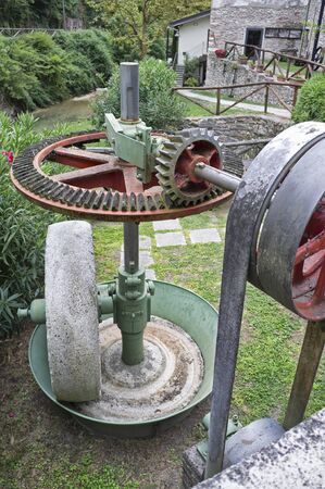 31 August 2019 - Paper Valley, Toscolano Maderno (BS) Italy, Paper Museum, detail of the millstone gear driven by the blades of the millのeditorial素材