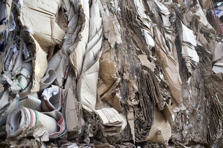 compressed paper and cardboard waiting recyclingの写真素材