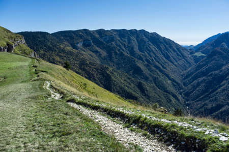 hiking trail in the Italian mountain. The Folgaria high Italian plateau for trekking and relaxation