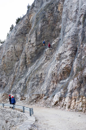 7/11/2020 Campobrun nature reserve, Trentino, Italy: installation of active rockfall barrier system is covering the mountain to prevent stones from falling downのeditorial素材