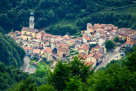 View of the village of Giazza near Verona, a pleasant, quiet summer resort, from Campofontana, Verona, Italyの写真素材
