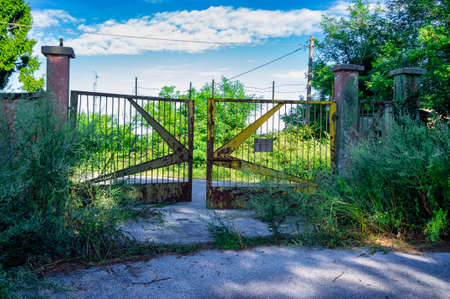 entrance to the abandoned area of the former military base of the Air Force on the top of Monte Calvarina, RoncÃ  (Verona) Italyの写真素材