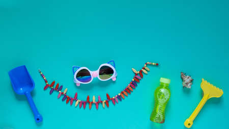 Set of baby beach accessories on light background.Flat layの写真素材