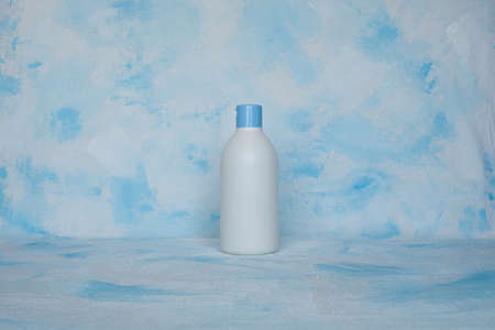 Bottle for cosmetic products without a label. Facial skincare concept. texture backgroundの写真素材