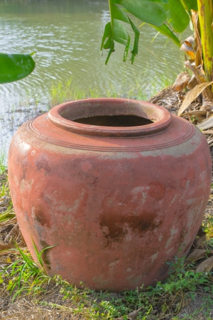 the amphora earthenware place in the garden before fill up waterの写真素材