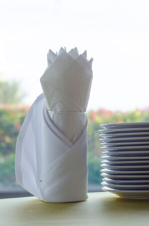 tissue paper in glass on the tableの写真素材
