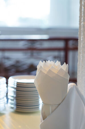 tissue paper in glass on the tableの写真素材