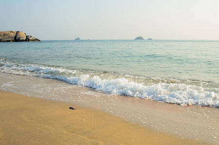 Sand beach background against sea and sky