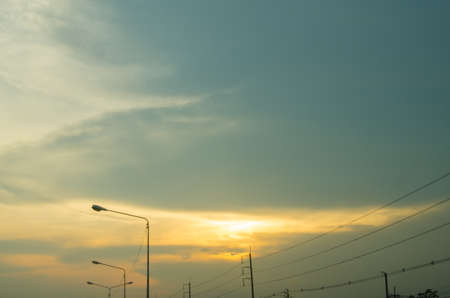 Sunset sky with street lamp postの写真素材