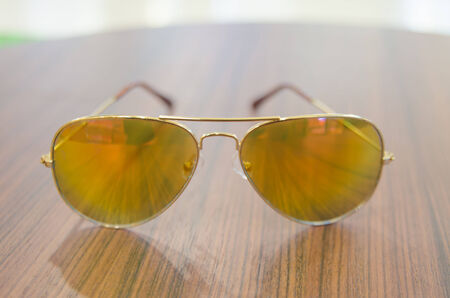 Eyeglasses on the wooden tableの写真素材