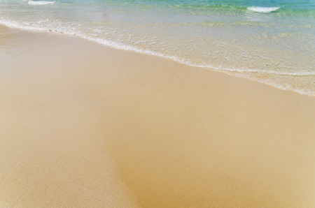Sand beach background with a soft light filter and blank space purpose