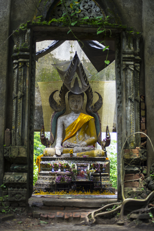 Ancient buddha statue in old churchの写真素材