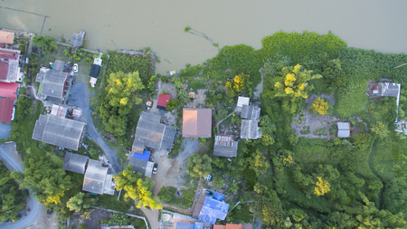 Aerial shot top view of Riverside community Pathum Thani , Thailandの写真素材